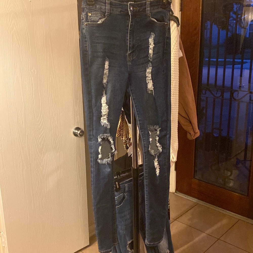 High waist ripped dark blue jeans